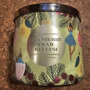 Brand new Bath and Body Works 3 Wick Cranberry Peach Bellini Candle